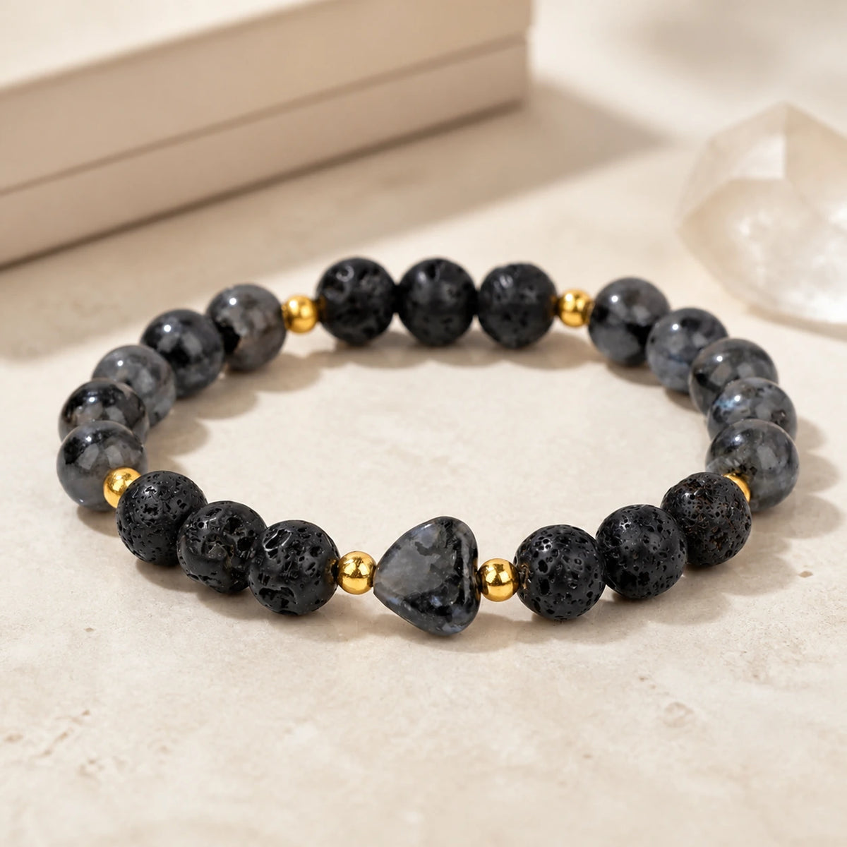 Moonlit Heart Labradorite and lava stone bracelet on ivory background