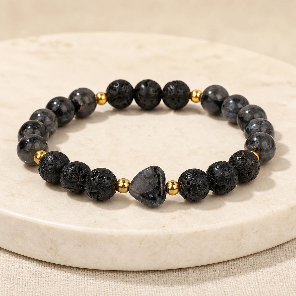 Side-angle view of Moonlit Heart gemstone and lava stone bracelet