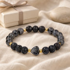 Moonlit Heart bracelet displayed with an ivory gift box on linen