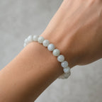 Pale labradorite bead bracelet worn on an adult wrist