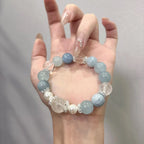 Aquamarine and Clear Quartz Beaded Bracelet Minimal White Background.