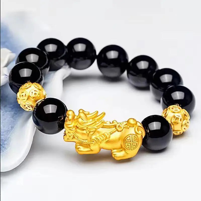 Black Obsidian Pixiu Bracelet styled with floral accents emphasizing wealth and good fortune.