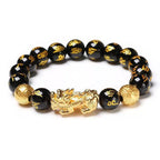Front view of a Black Obsidian Pixiu Bracelet featuring polished gemstone beads and guardian charm.