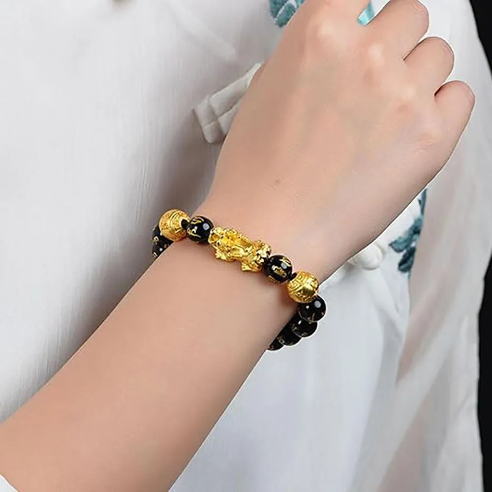 Black Obsidian Pixiu Bracelet worn on wrist showcasing elegant everyday protection jewelry.