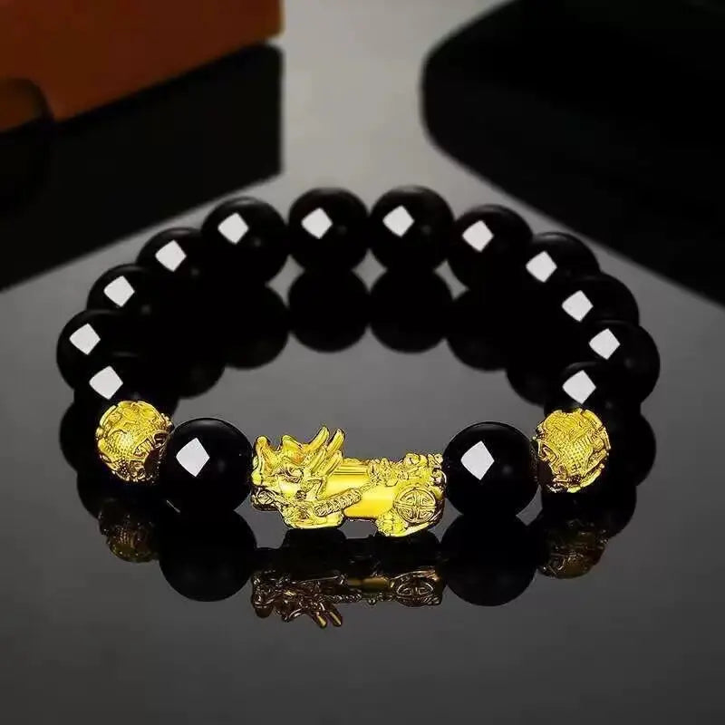 Black Obsidian Pixiu Wealth Bracelet featuring polished obsidian beads and prosperity symbolism.