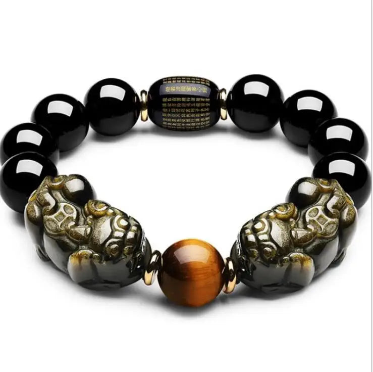 Black obsidian protection bracelet isolated on a white background showing polished gemstone details.