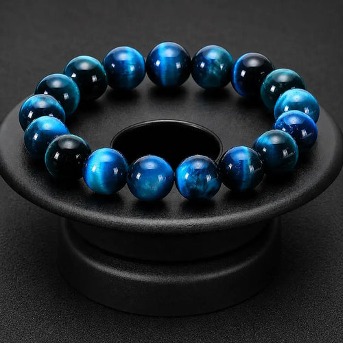 Luxury Blue Tiger Eye Bracelet by Mariv Stones with Deep Ocean Blue Gemstone Beads and Elegant Minimalist Display.