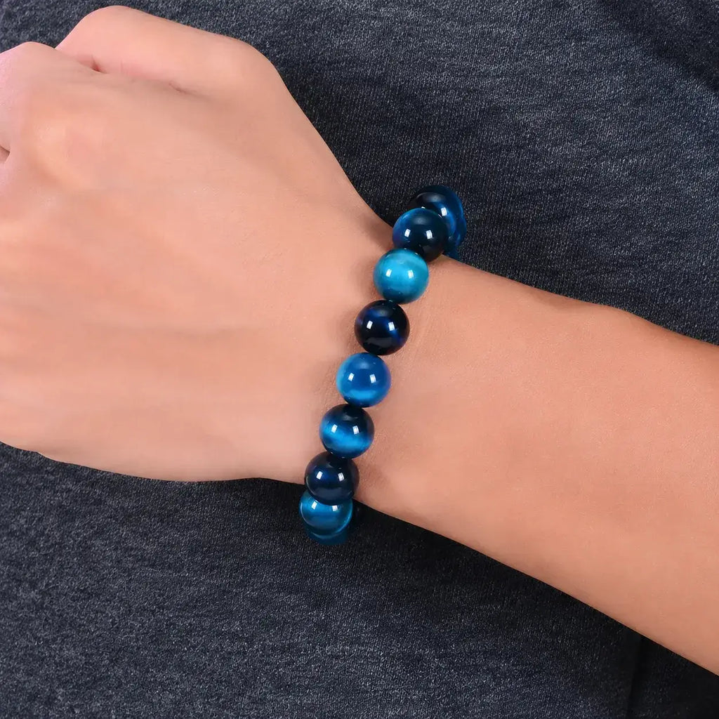 Mariv Stones Blue Tiger Eye Beaded Bracelet Worn on Wrist for Everyday Style, Calm Energy and Modern Jewelry Fashion.