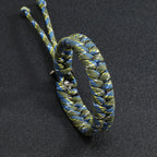 Angled product view of green blue paracord bracelet for men