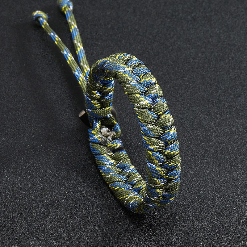 Angled product view of green blue paracord bracelet for men