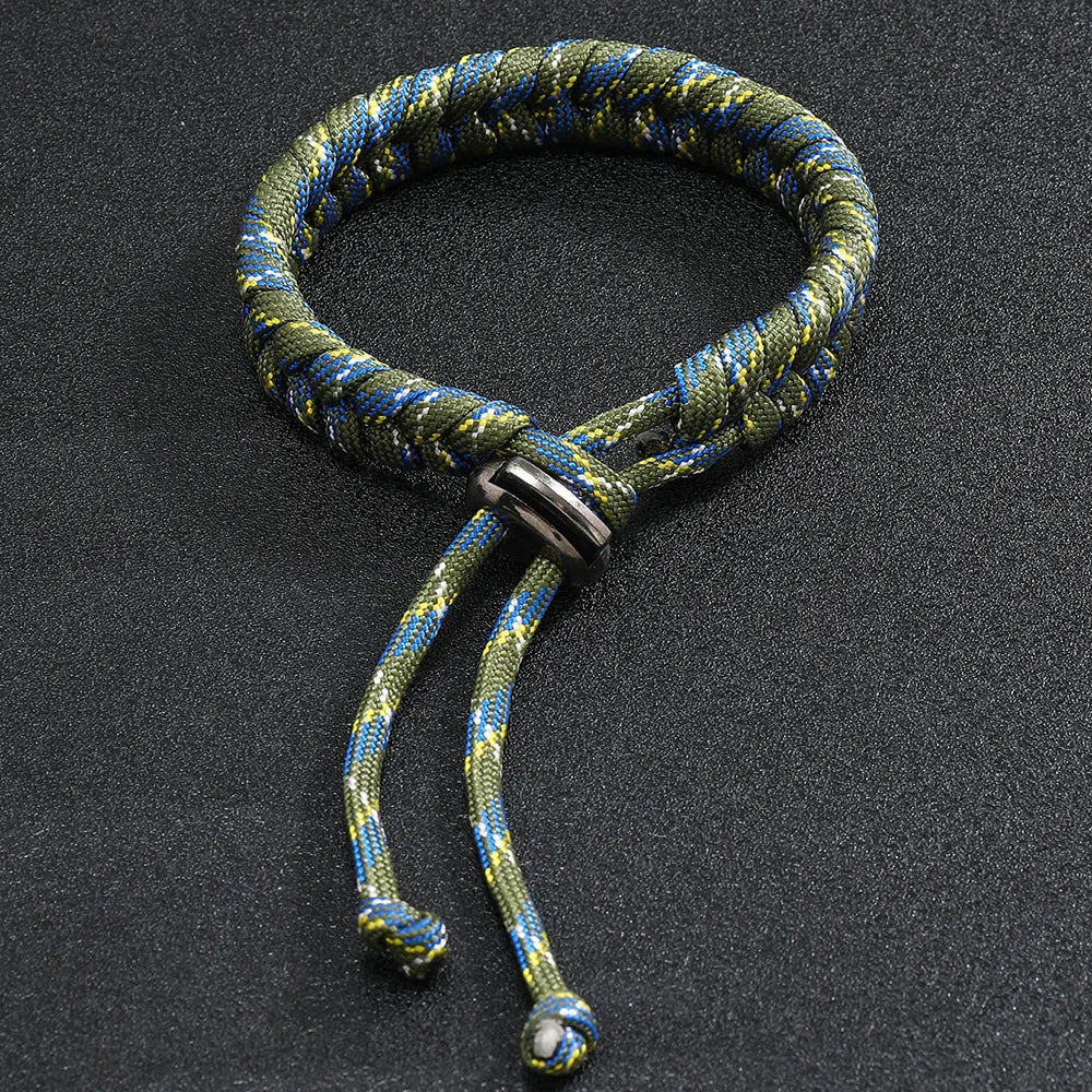 Detailed view of green blue braided paracord bracelet with adjustable fit