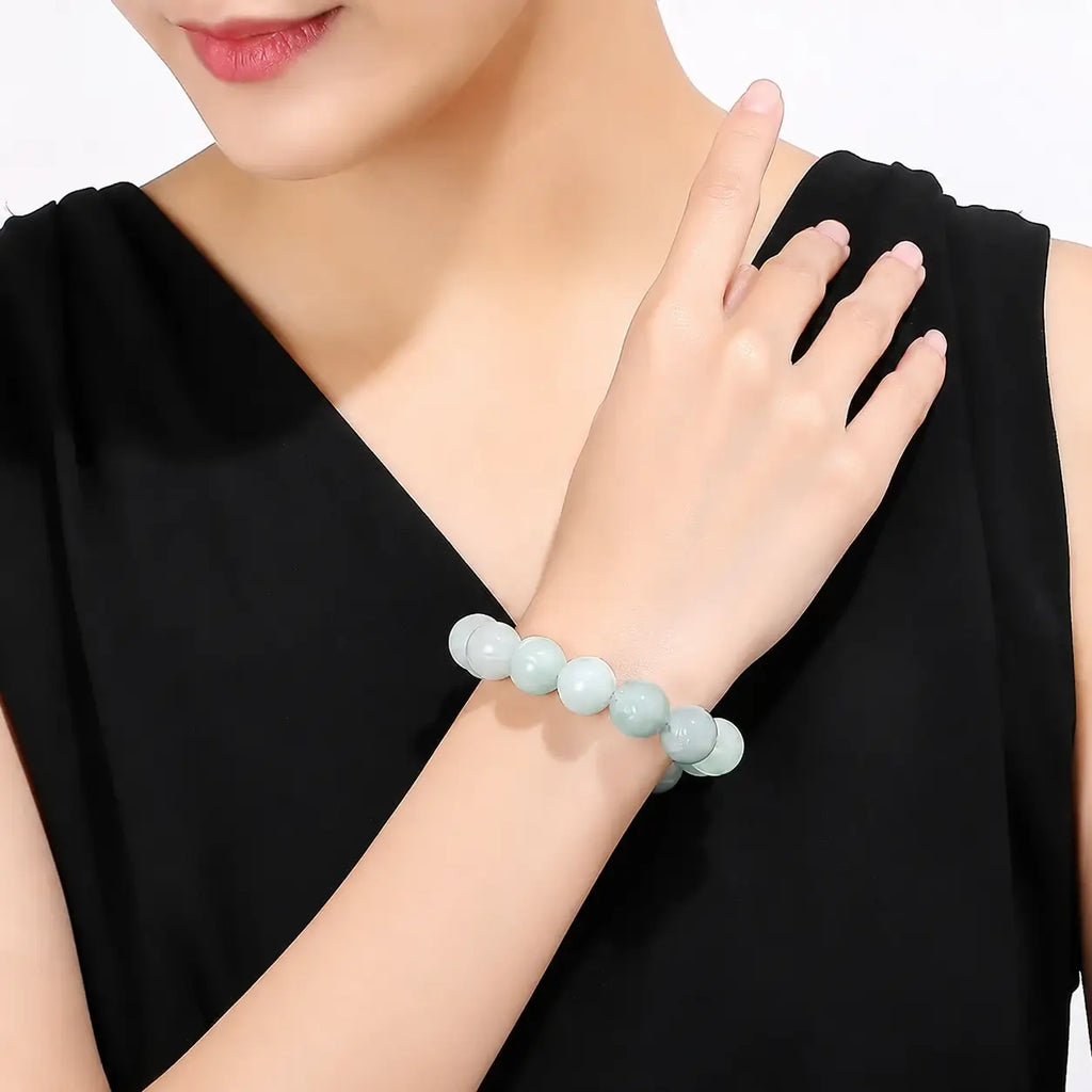 Natural Burmese jade lotus bracelet, Mariv Stones collection.