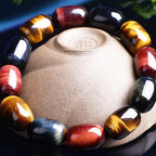 Elegant Mariv Stones tiger eye bracelet styled on a ceramic base.