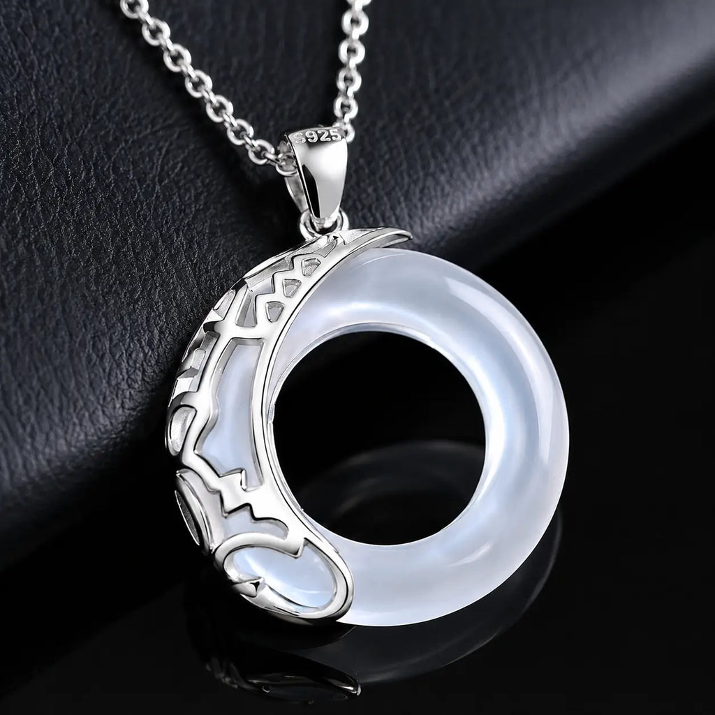 Moonstone halo pendant necklace with sterling silver detailing by Mariv Stones.