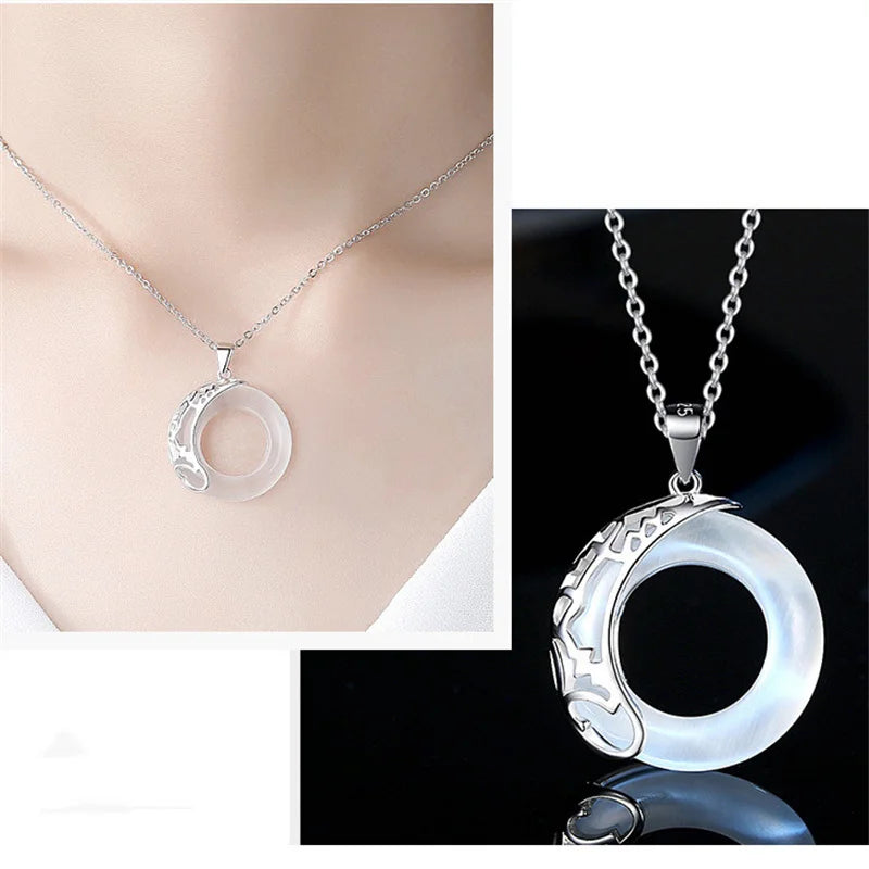 Moonstone pendant necklace worn on model by Mariv Stones.