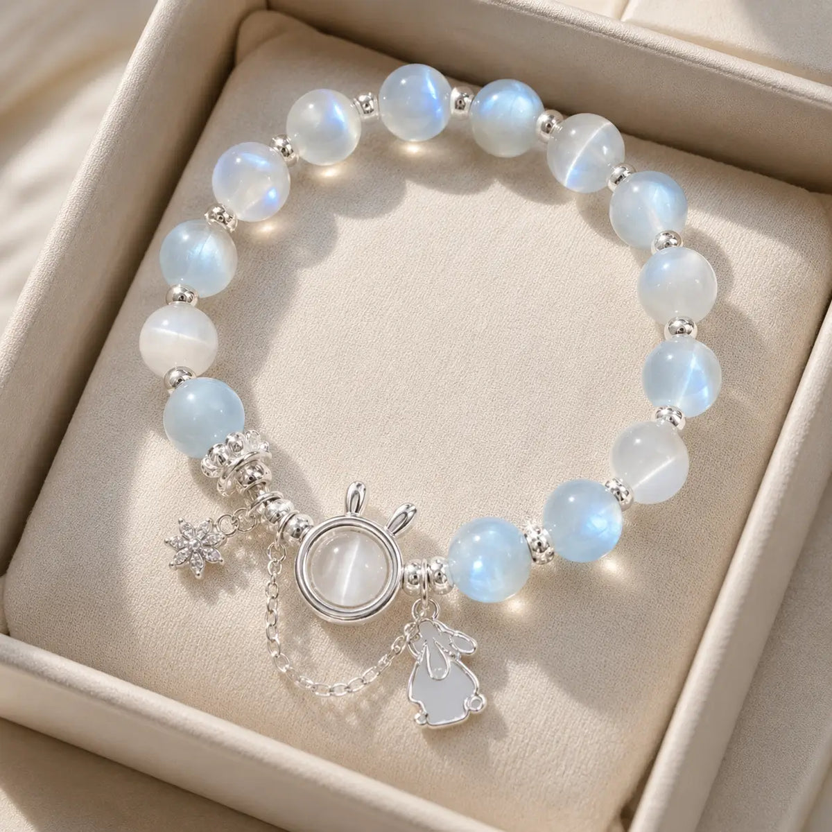Moonstone rabbit bracelet presented in a premium beige jewelry gift box.