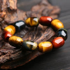 Natural multi-color tiger eye stone bracelet for grounding and protection by Mariv Stones.