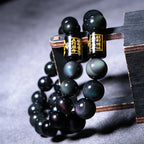 Rainbow Eye Obsidian bracelets displayed together highlighting natural gemstone colors.