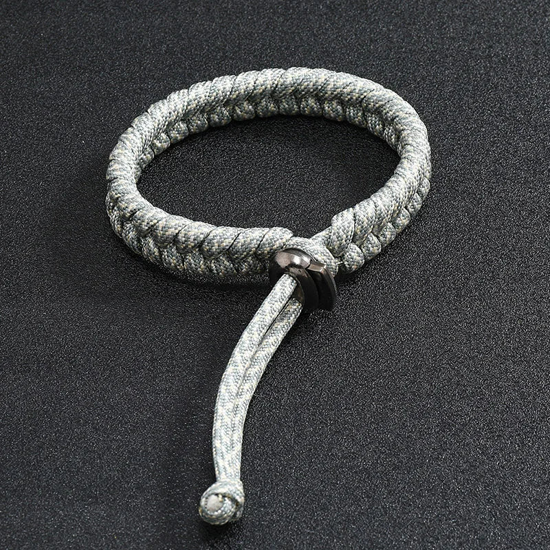 Close up detail of silver grey handwoven paracord bracelet craftsmanship