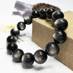 Silver Sheen Obsidian Bracelet showcased on a jewelry display box, highlighting natural silver reflections and everyday elegance.