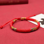 Traditional red string bracelet with five-color woven accents, crafted for daily wear, positive energy, and symbolic protection