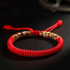 Tibetan five-color lucky knot bracelet with adjustable red string design, symbolizing protection, blessings, harmony, and everyday good fortune
