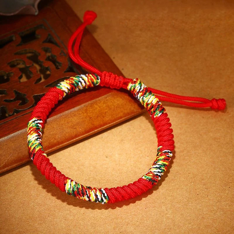 Traditional Tibetan blessing bracelet with adjustable closure and five-color thread details symbolizing harmony and fortune